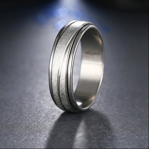 Anillo Acero Giratorio Plateado grabado